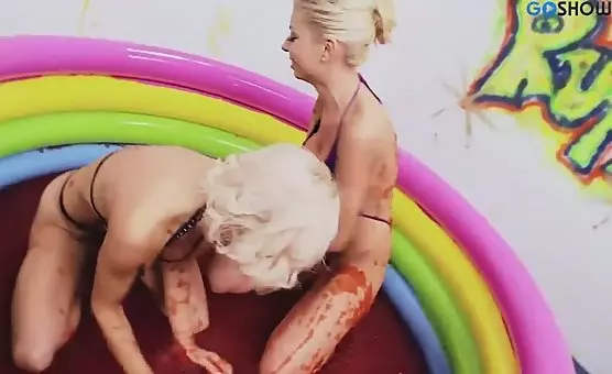 Blonde and Brunette Unite for Passionate Poolside Pleasures